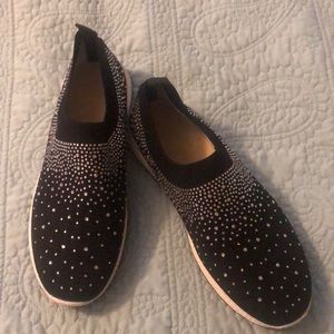 Black shoes with crystals.